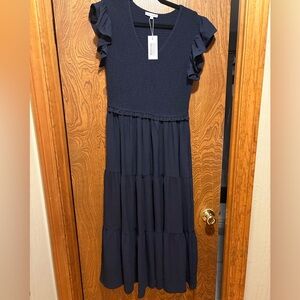 Baltic born smocked navy dress